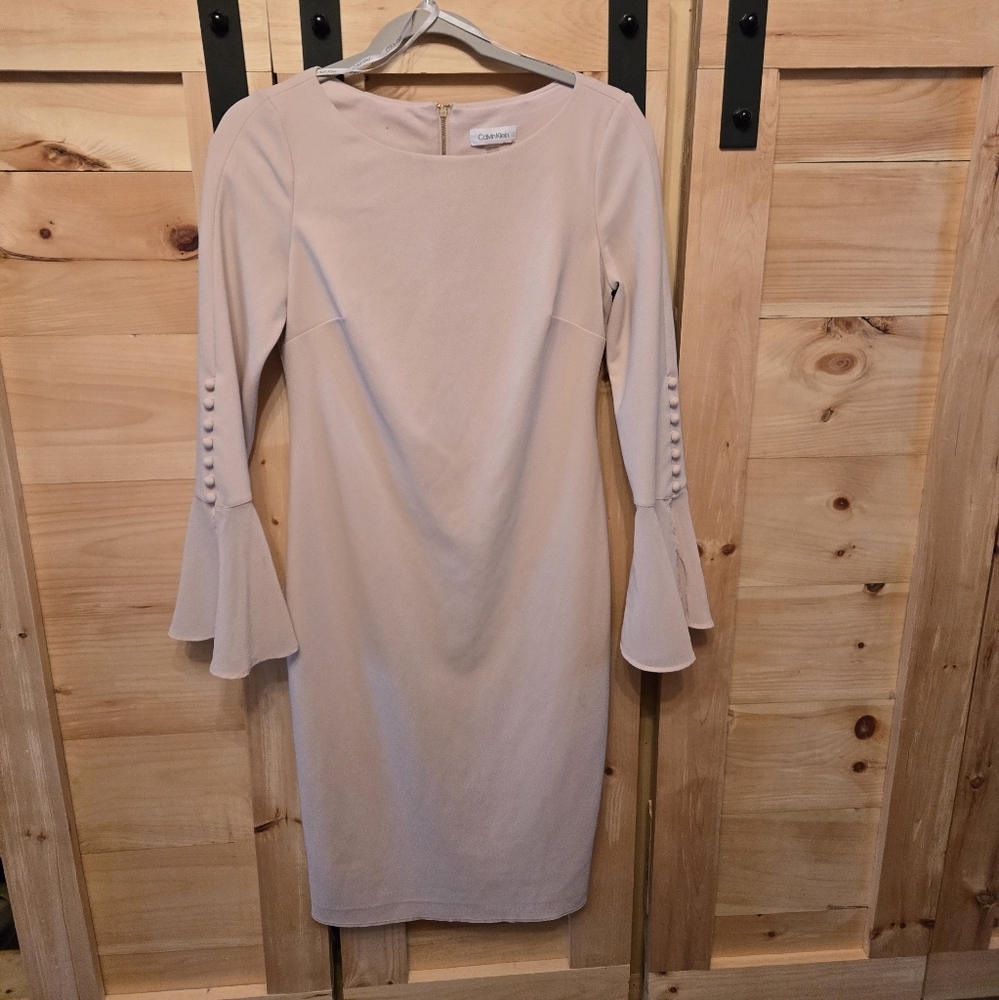 Elegant Pale Pink Dress with Unique Sleeves